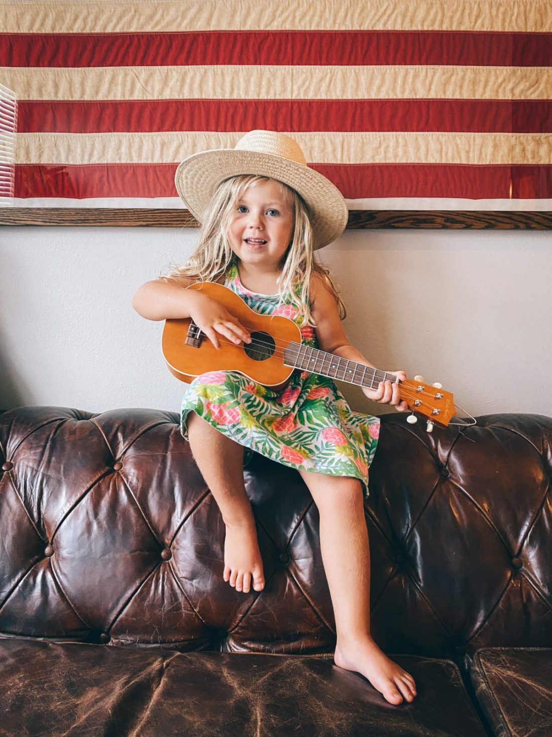 child playing the ukulele